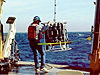  Launching a CTD device off a ships's fantail.