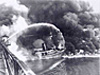 Firefighters battle the 1969 Cuyahoga River fire.
