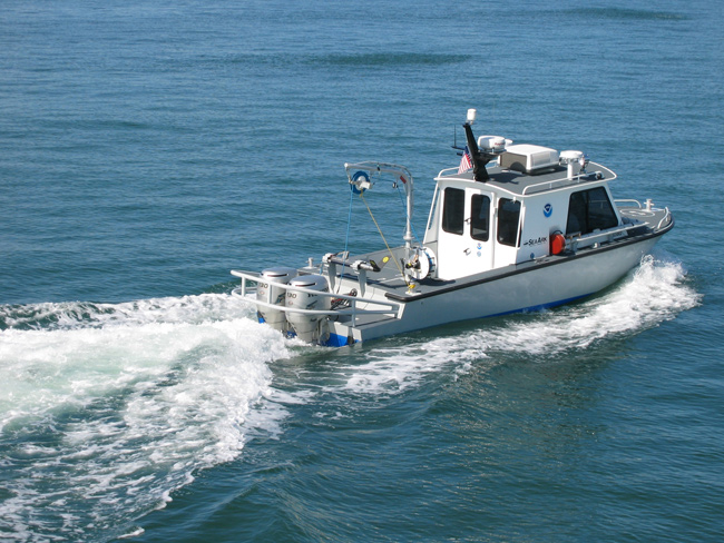 A survey vessel collects data