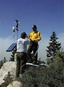 Incident meteorologists taking readings and providing forecasts in the field