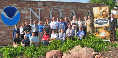 NOAA Fisheries Service personnel with staff members of the Space Environment Center