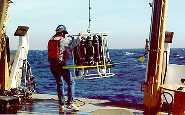 Launching a CTD device off a ships's fantail.