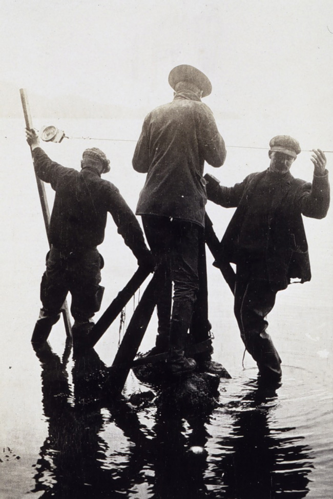 Taping in southeast Alaska as the tide comes in, 1916