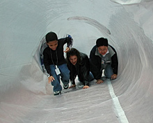 Children enjoy climging through the belly of a whale.