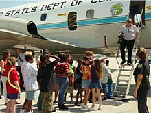 School children visit the NOAA hurricane hunter aircraft while on a stop in Mobile, Alabama.