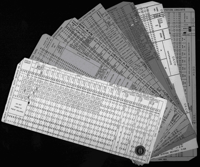 A punch card is a heavy paper card on which coded numbers or alphabetic characters were punched. 