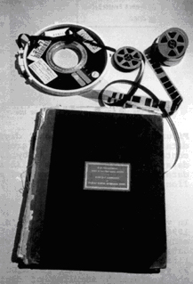 Clockwise from top: nine-track tape, 16-millimeter film, 35-millimeter film, and a 1870s logbook.
