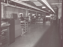 This photo, taken in Building 160 of the Washington Navy Yard, shows tabulation equipment operators machine that sorted and collated punch cards containing oceanographic data and then printed the data from the cards.