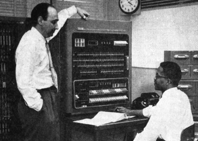 Fred  Shuman (left) and Otha Fuller circa 1955 at the IBM 701