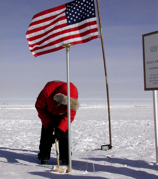 Researchers take a little time out for some croquet outside the South Pole Observatory in 2005.  