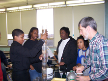 Students at Howard D. Woodson High School in Washington, DC, investigate water quality in the Anacostia as part of the NOAA Emerging Scientist Program.