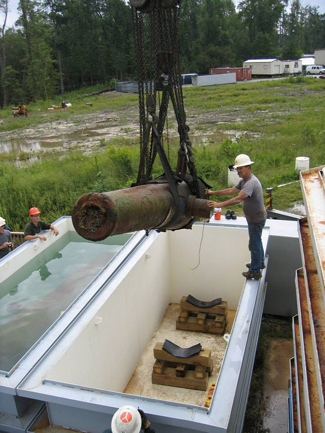 Monitor's cannons placed in conservation tank