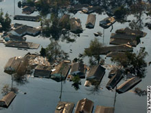 Photograph showing a neighborhood flooded after Hurricane Katrina.