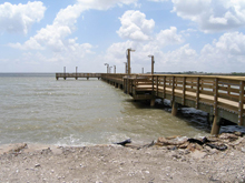 A 300 foot lighted fishing pier in the bay front park to restore access to the recreational fisheries.
