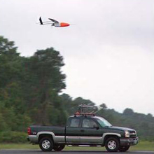 An aerosonde unmanned aerial vehicle is released from its transport vehicle on the runway at the National Aeronautics Space Administration (NASA) Wallops flight facility in Wallops Island, Virginia.