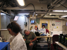 Scientists from AOML and other collaborators hard at work in the Wetlab onboard the Nancy Foster, analyzing data taken during a recent FACE cruise.