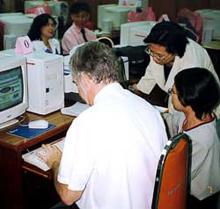 An EPA trainer helps students as they learn to use CAMEO in Bangkok, Thailand.